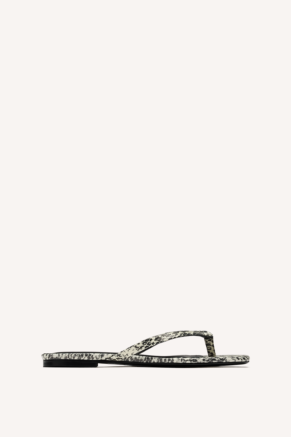 Nelson Made snake emboss print thong sandal with a flat sole, shown in profile against a solid off-white background.