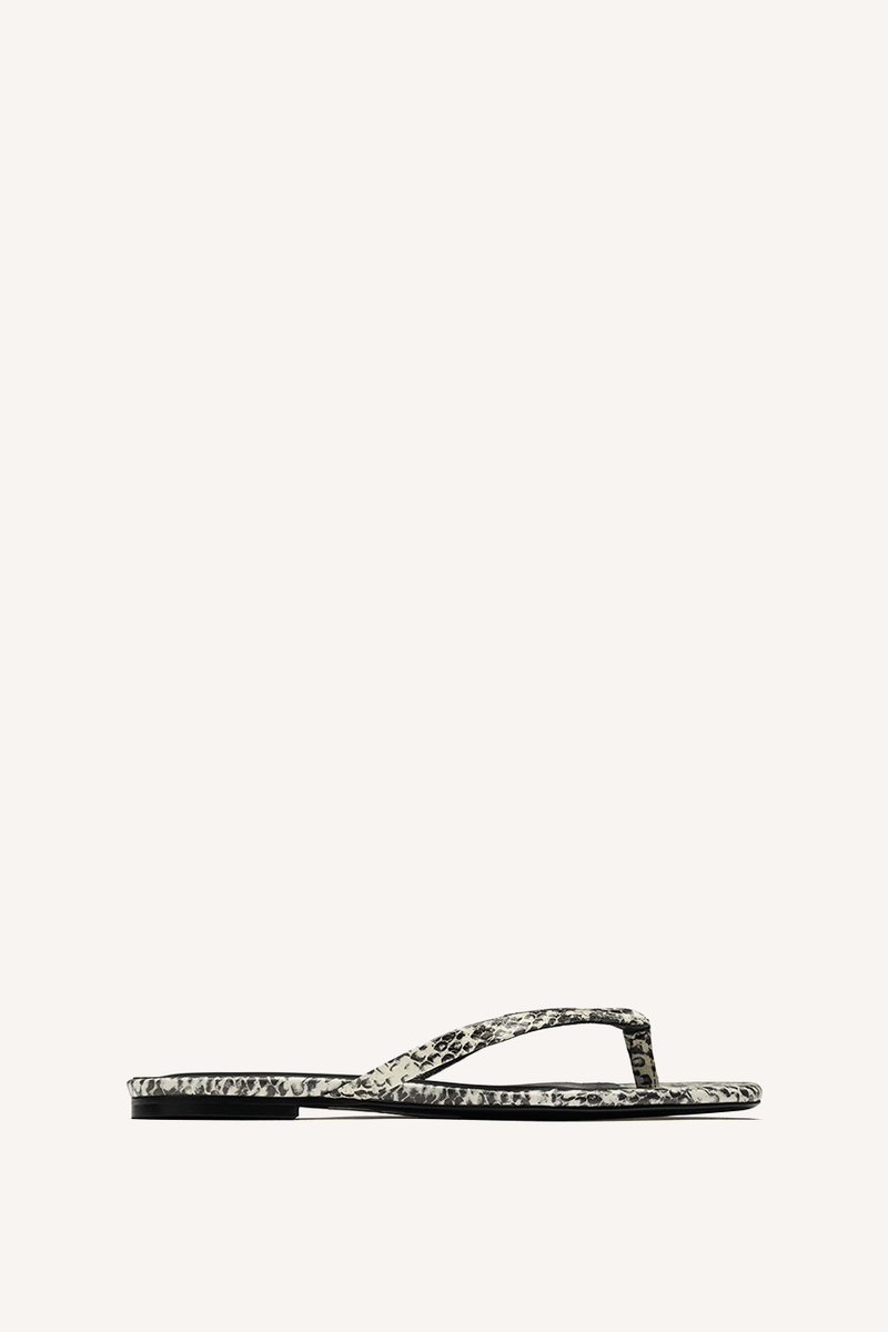 Nelson Made snake emboss print thong sandal with a flat sole, shown in profile against a solid off-white background.